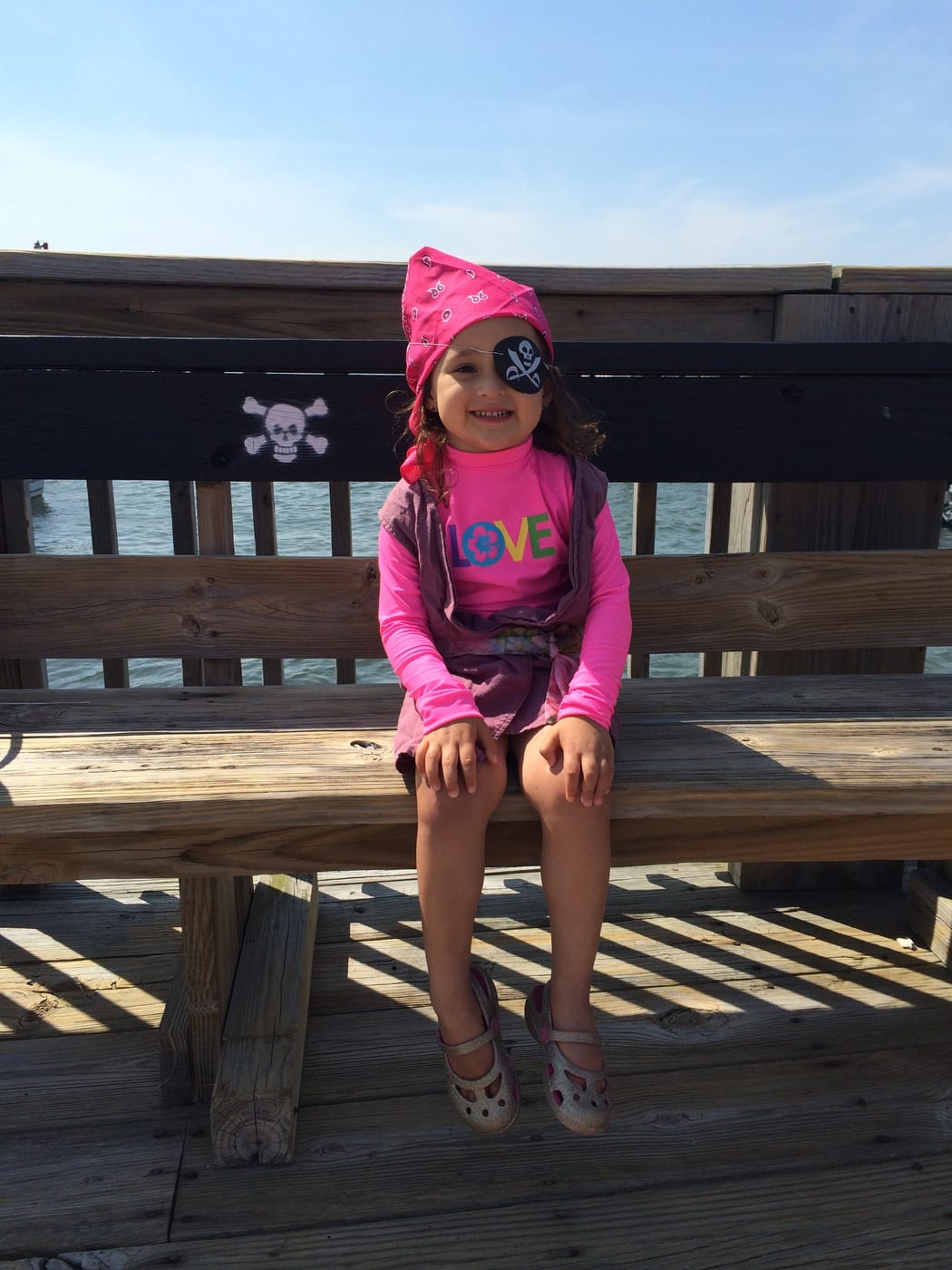 Little Lucy pirate on pier